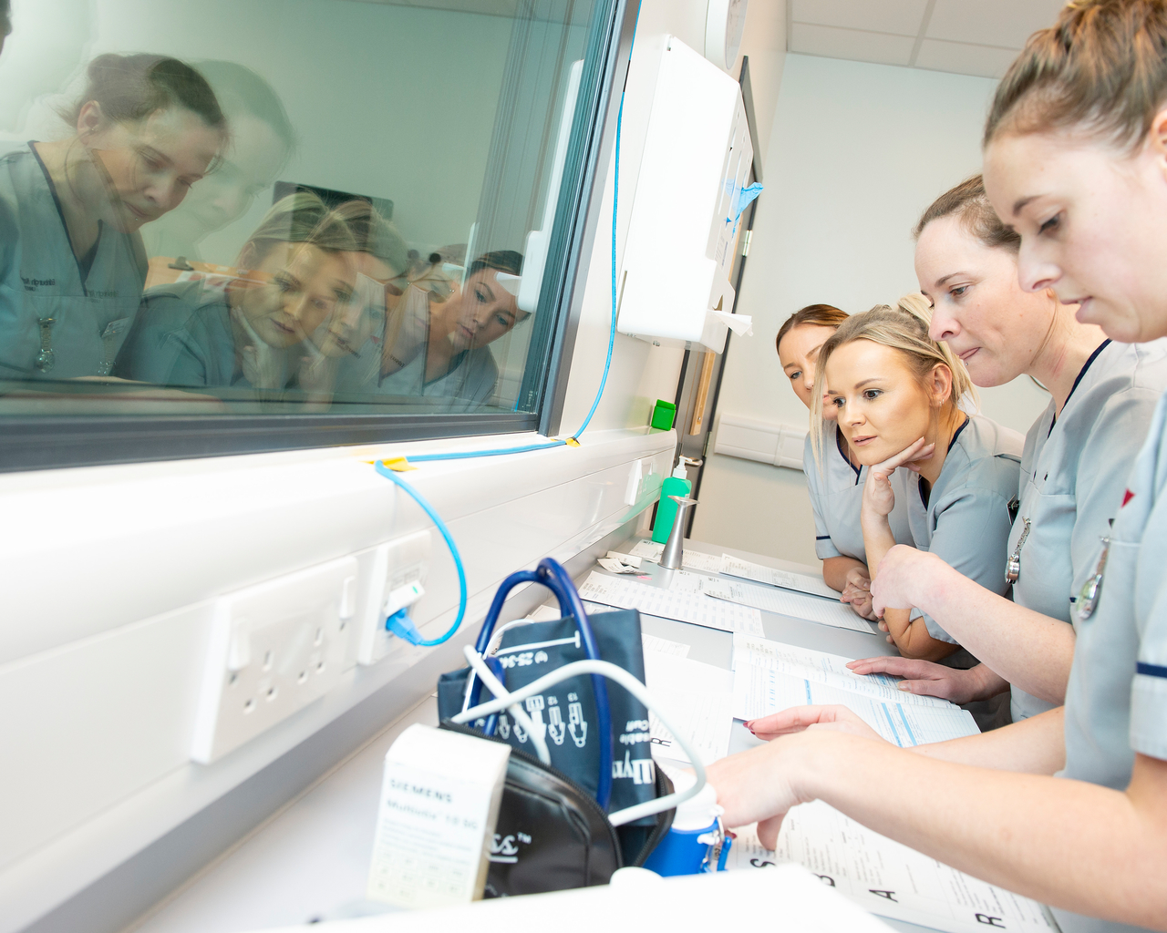 Midwifery students prepare for an induced labour