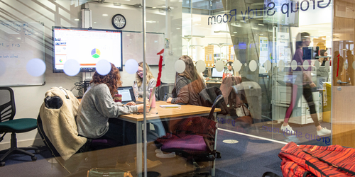 Students working inside the group study rooms in Craiglockhart campus.