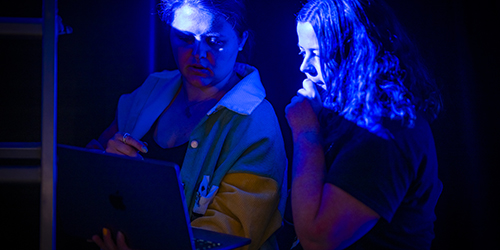 People in blue light