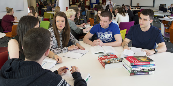 Students sat around a table
