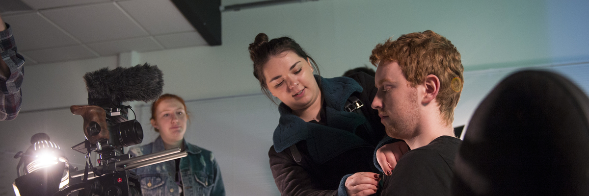 Television students rehearse a scene as part of a television drama module in the TV studio