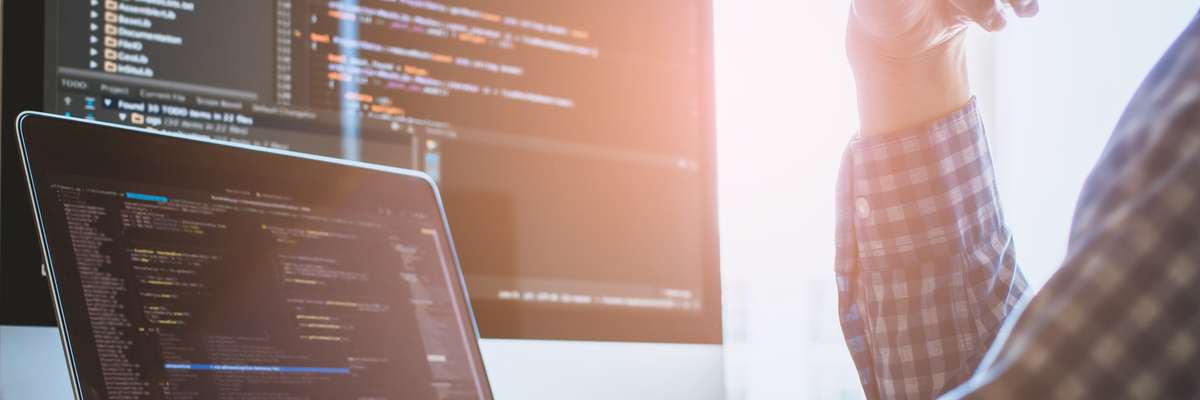 Person at computer coding