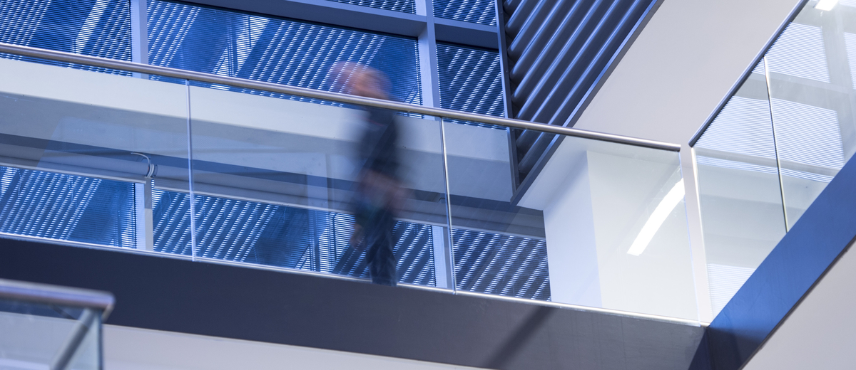 Interior photo of atrium in Edinburgh Napier University Sighthill campus building.