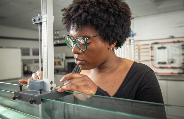 An Edinburgh Napier student working on a project within an engineering lab at Merchiston campus. 