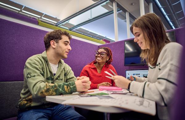Three undergraduate students from Edinburgh Napier University studying in the The Jack Kilby Computer Suite at the Merchiston campus. 