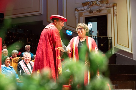 Professor Sue Rigby with ENU Chancellor Will Whitehorn on stage at the Usher Hall