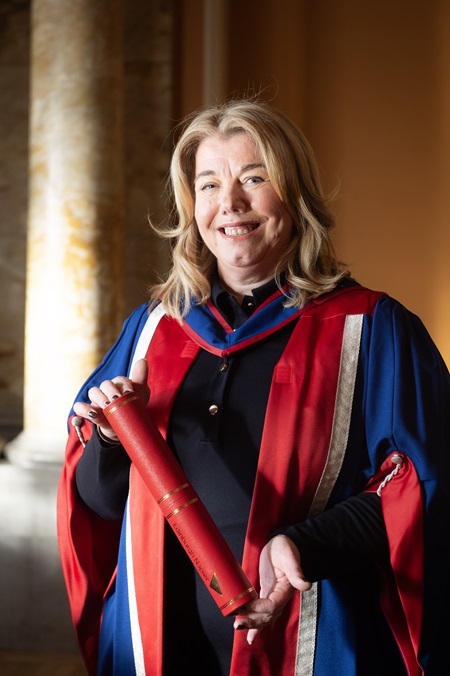 Theresa Shearer poses with her honorary degree at the Usher Hall in Edinburgh