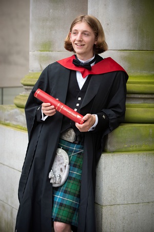 Sonny Scott with his degree at the Usher Hall