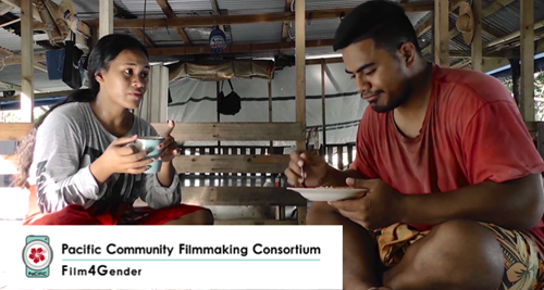 Still from one of the films featuring man and woman eating and drinking tea