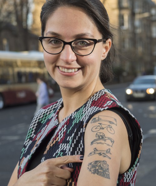 Emine Akgun showing her tattoo