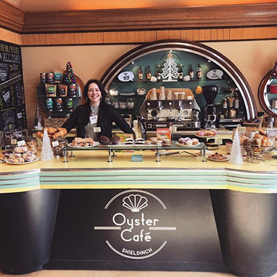 Emma behind the counter at the Oyster Cafe