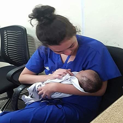 Image of Chloe with a patient