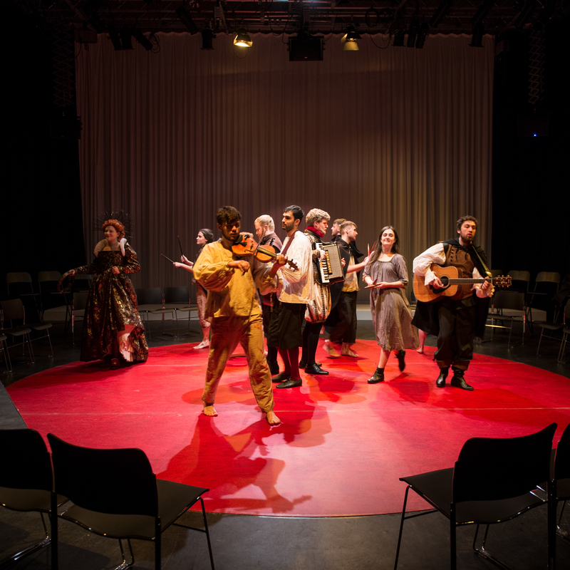 Some acting students performing on stage