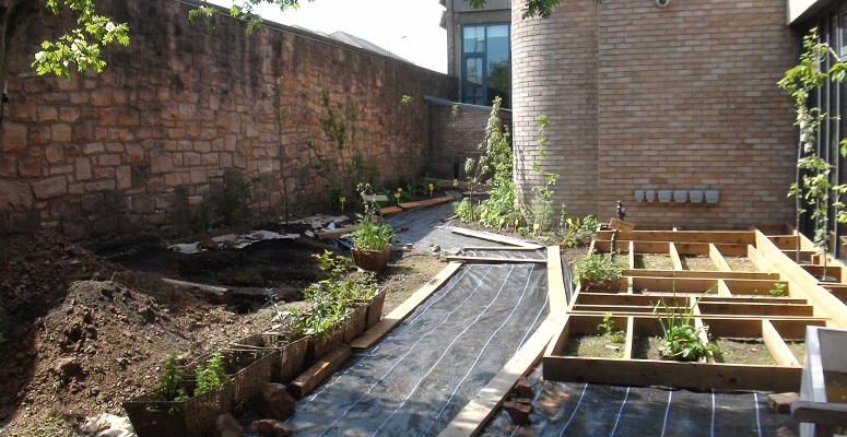 Planting at the Lions' Gate garden