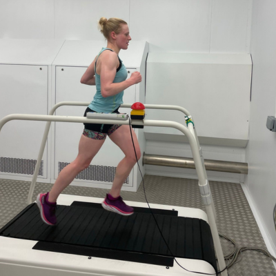 Female athlete running on treadmill