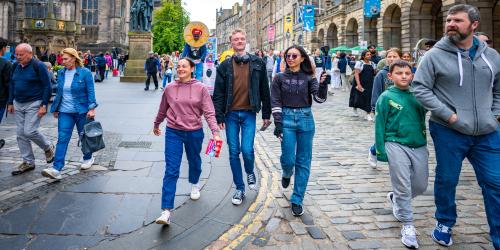 students walking on the royal mile
